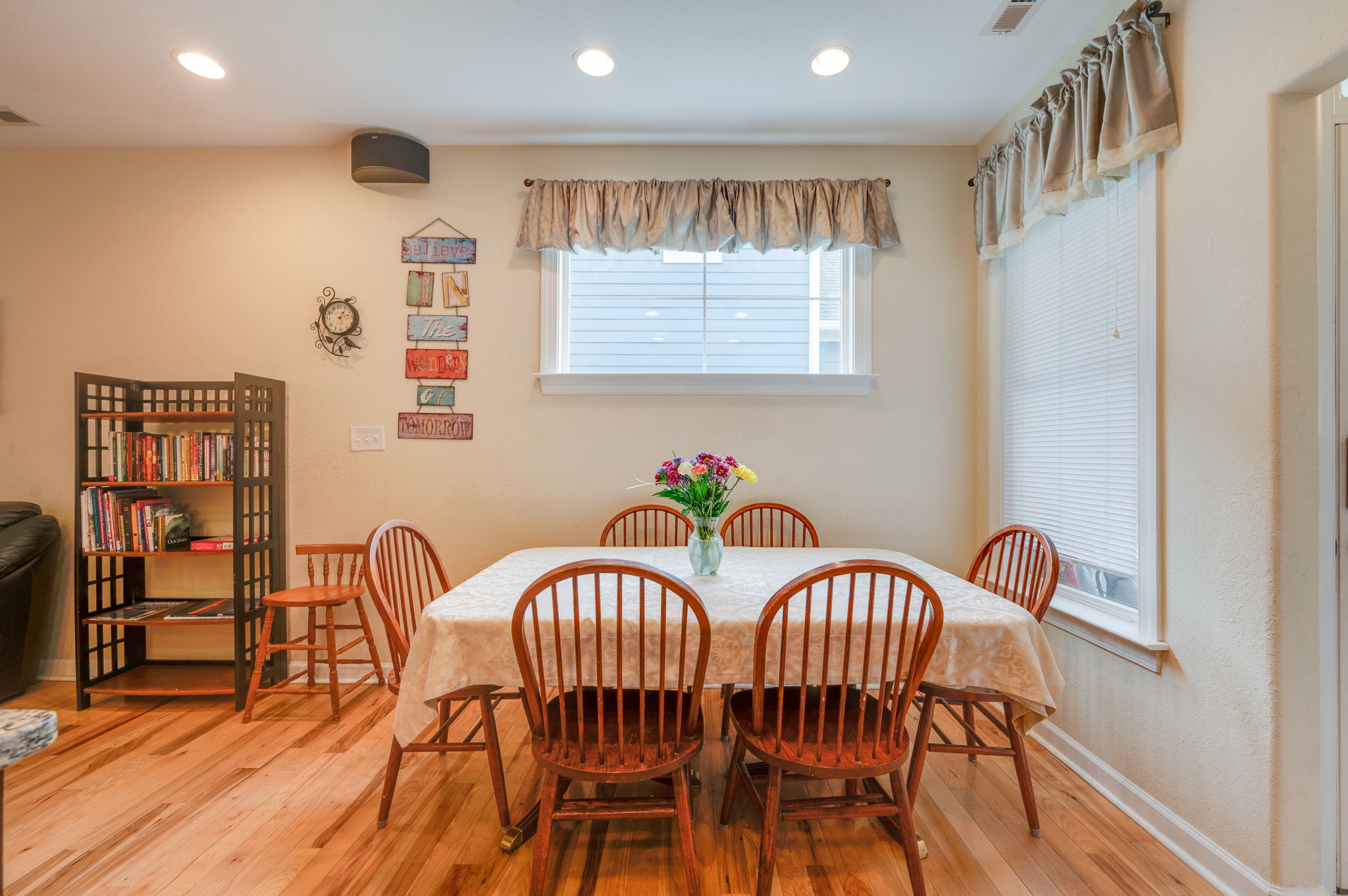 Kitchen featuring dark wooden cabinets, stainless steel appliances, and granite countertops.