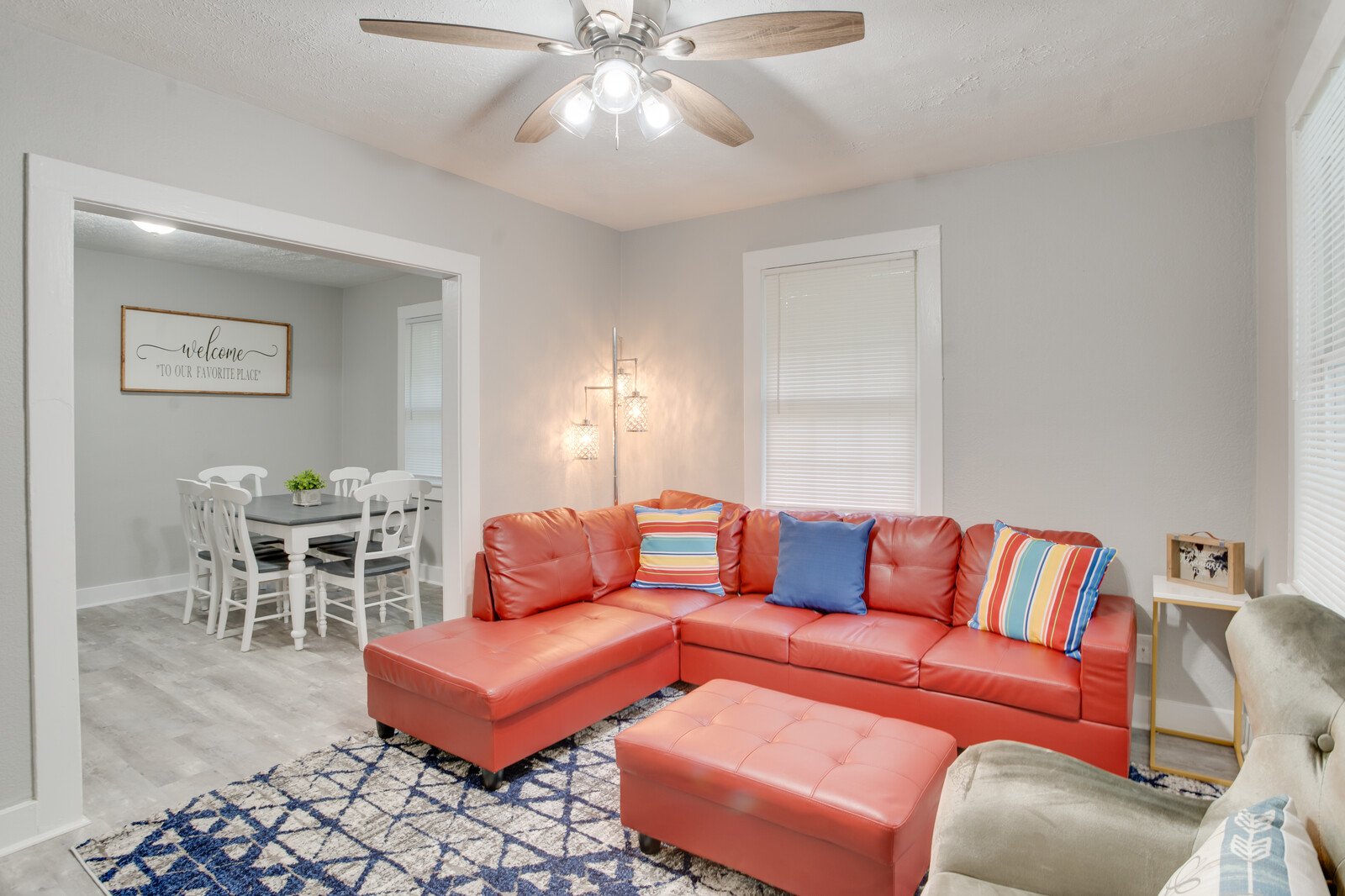 Cozy living room with red sectional sofa and stylish decor
