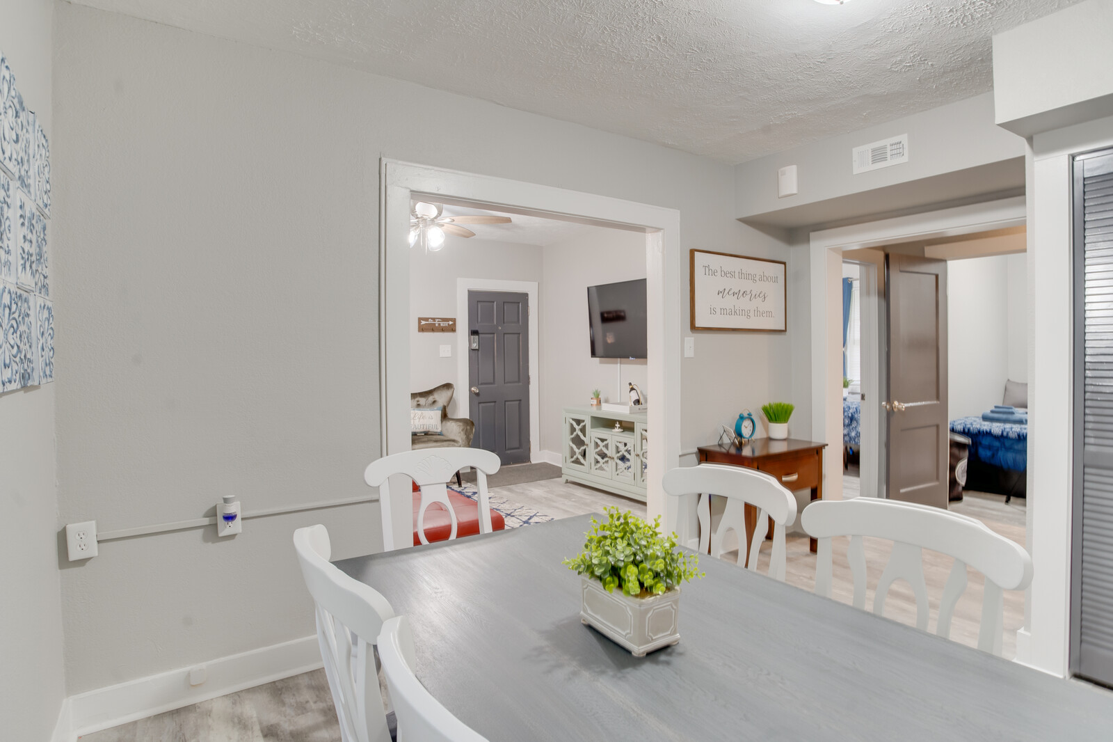 Dining area with a view of the living room and bedroom entrance