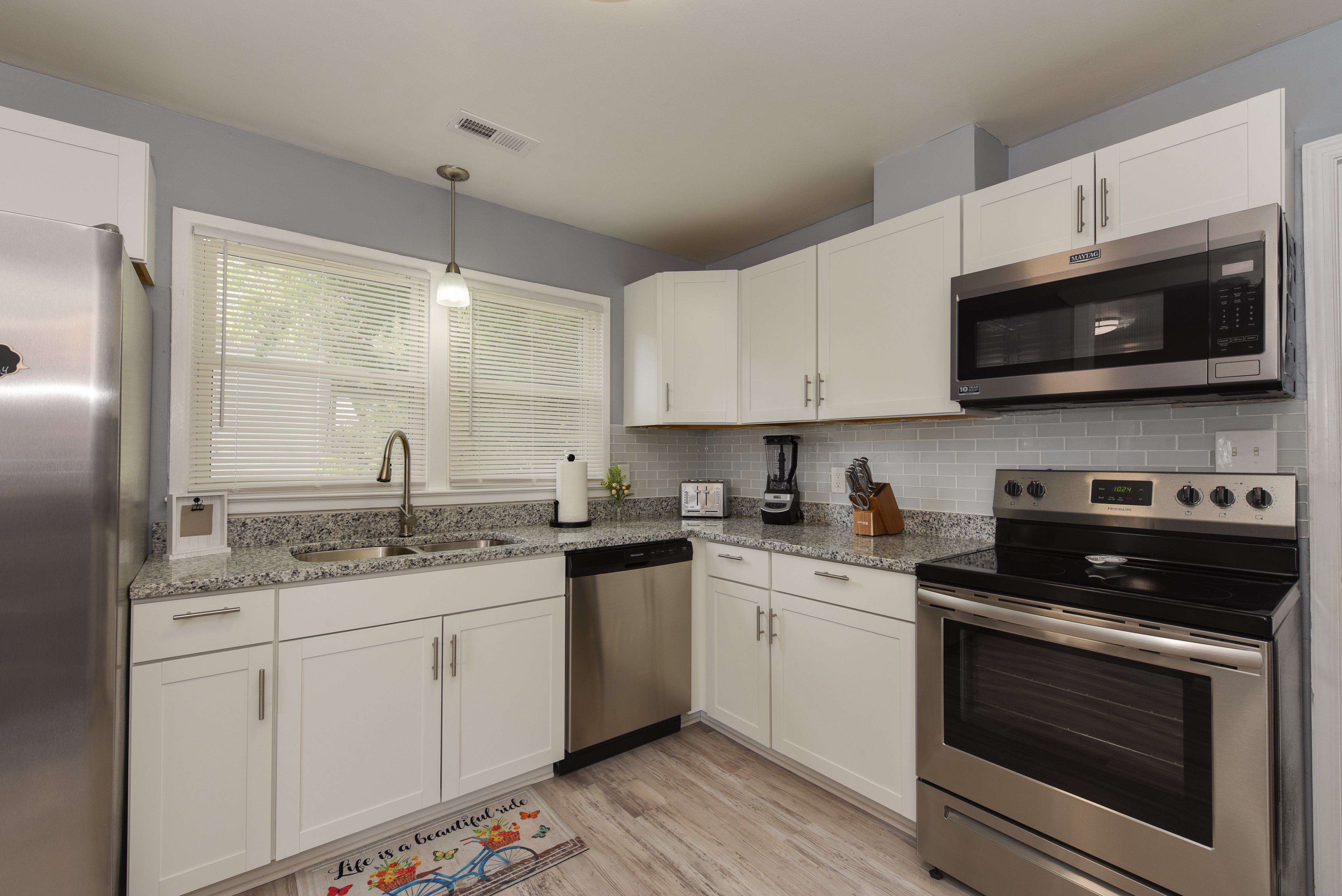 Stylish kitchen with granite countertops and sleek finishes