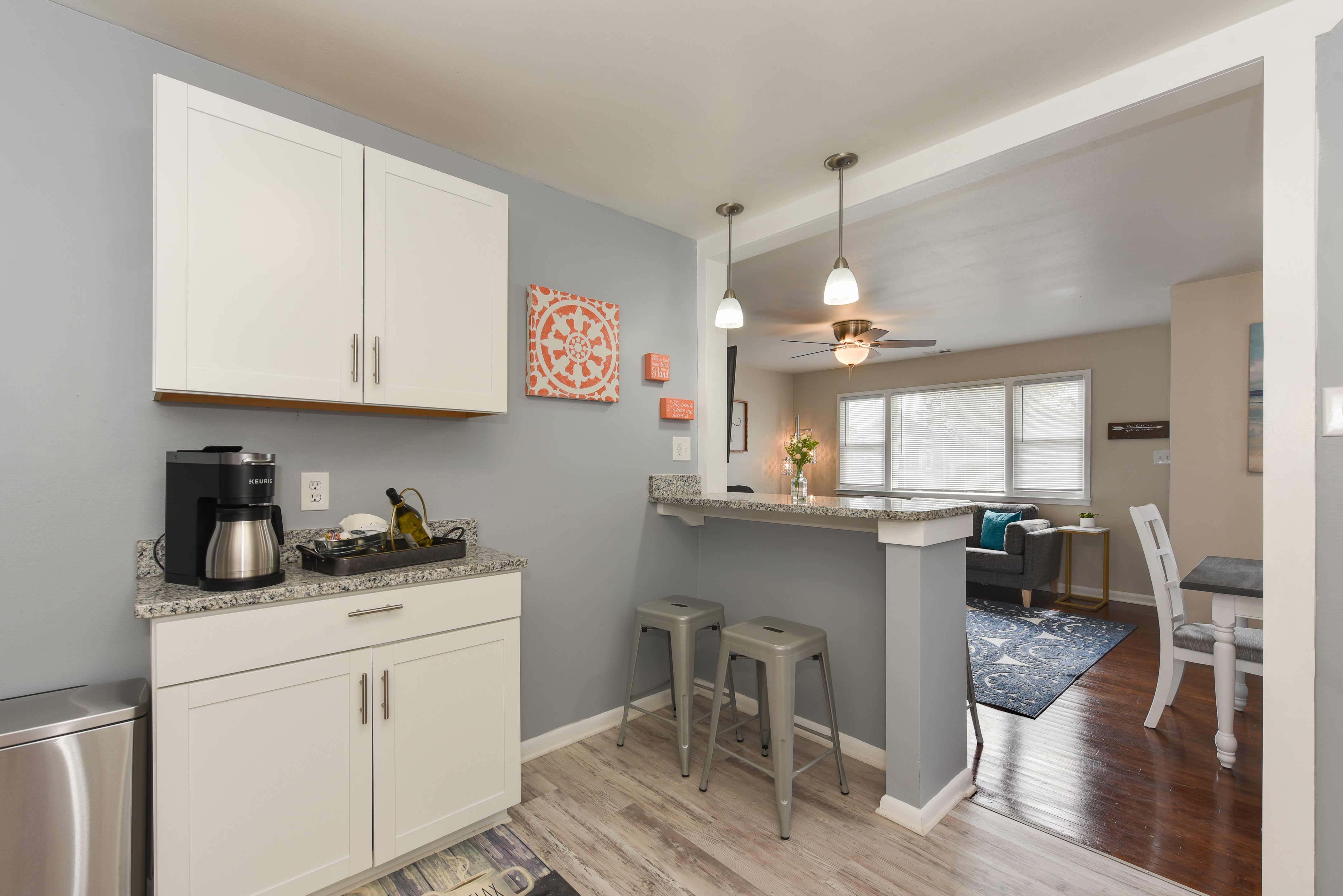 Kitchen bar area with pendant lighting and seating